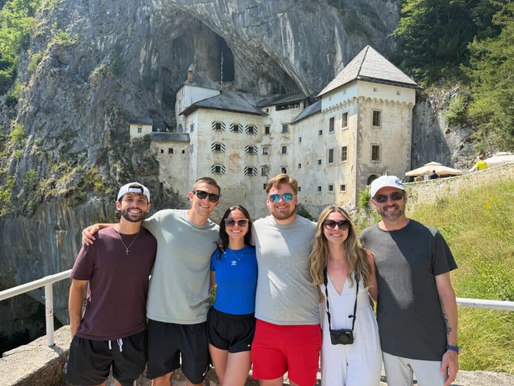 Predjama Castle with Family